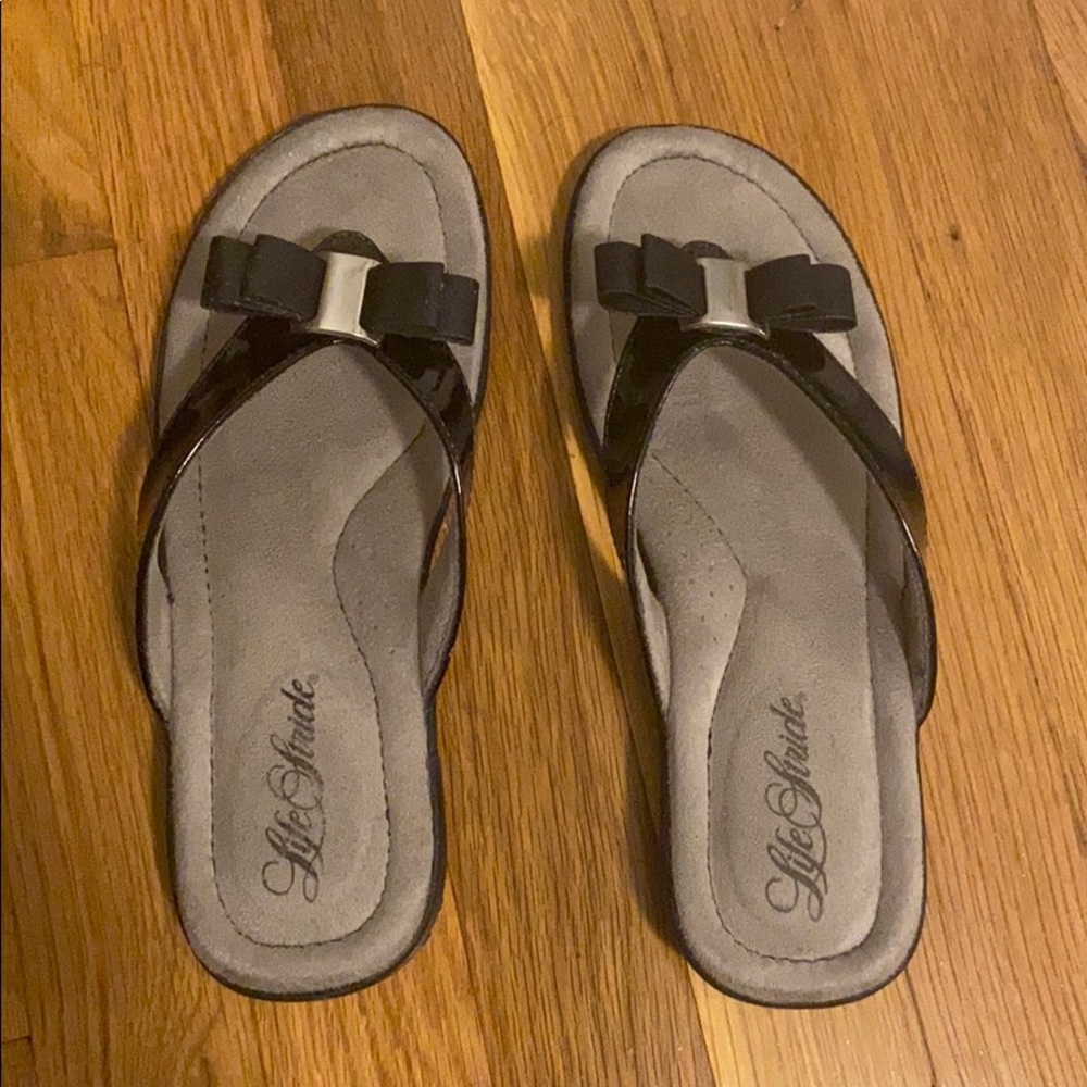 Barely worn black with bow Life Stride sandals